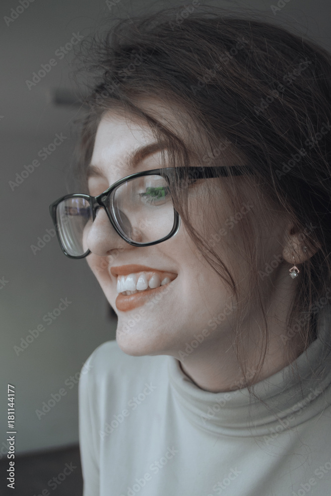 Portrait of a happy woman. Smile on the face. Woman in glasses. Portrait of a happy woman. Smile on the face. Woman in glasses.
