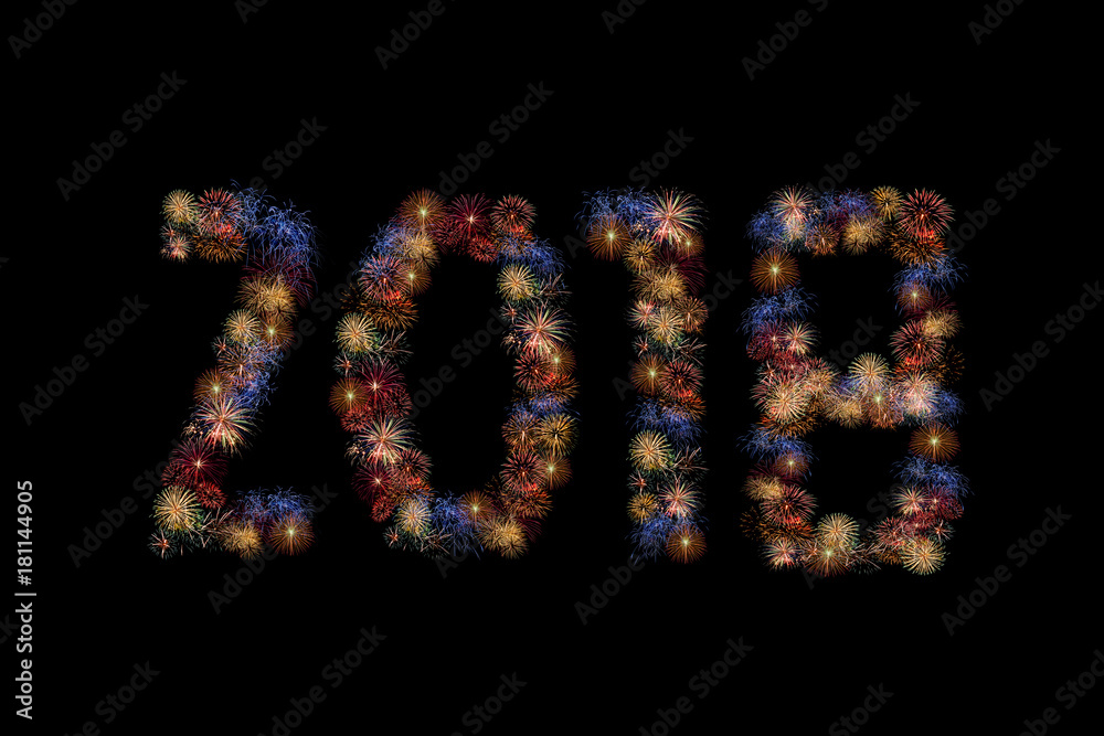 Colour fireworks forming new year 2018 AD on black background.Photo design for Celebrations and happy new year background concept.