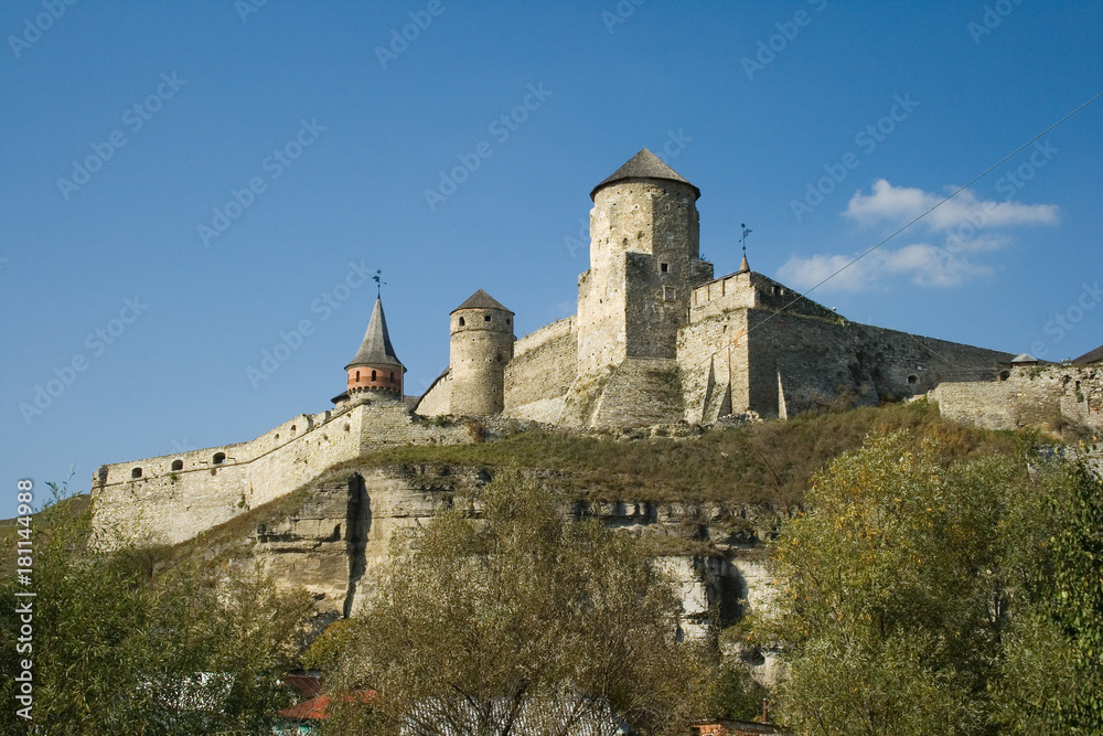 Summer view to castle in Kamianets-Podilskyi