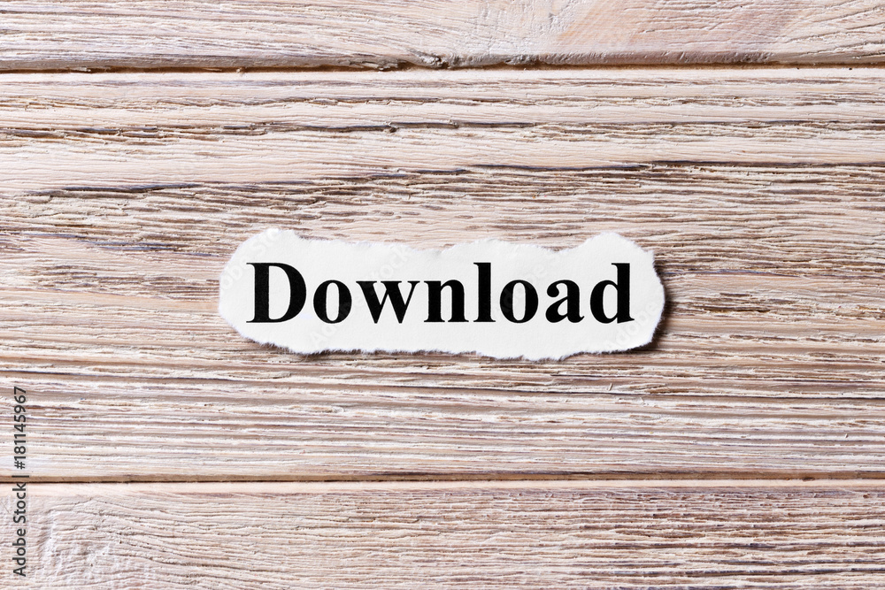 DOWNLOAD of the word on paper. concept. Words of DOWNLOAD on a wooden background DOWNLOAD of the word on paper. concept. Words of DOWNLOAD on a wooden background
