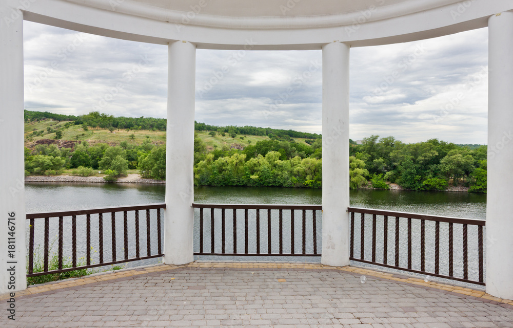 Gazebo overlooking the river and the opposite shore Gazebo overlooking the river and the opposite shore