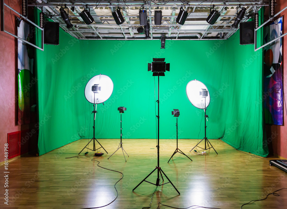 Studio for movies. Green screen. The chroma key. Lighting equipment in the  pavilion. Show business Stock Photo | Adobe Stock