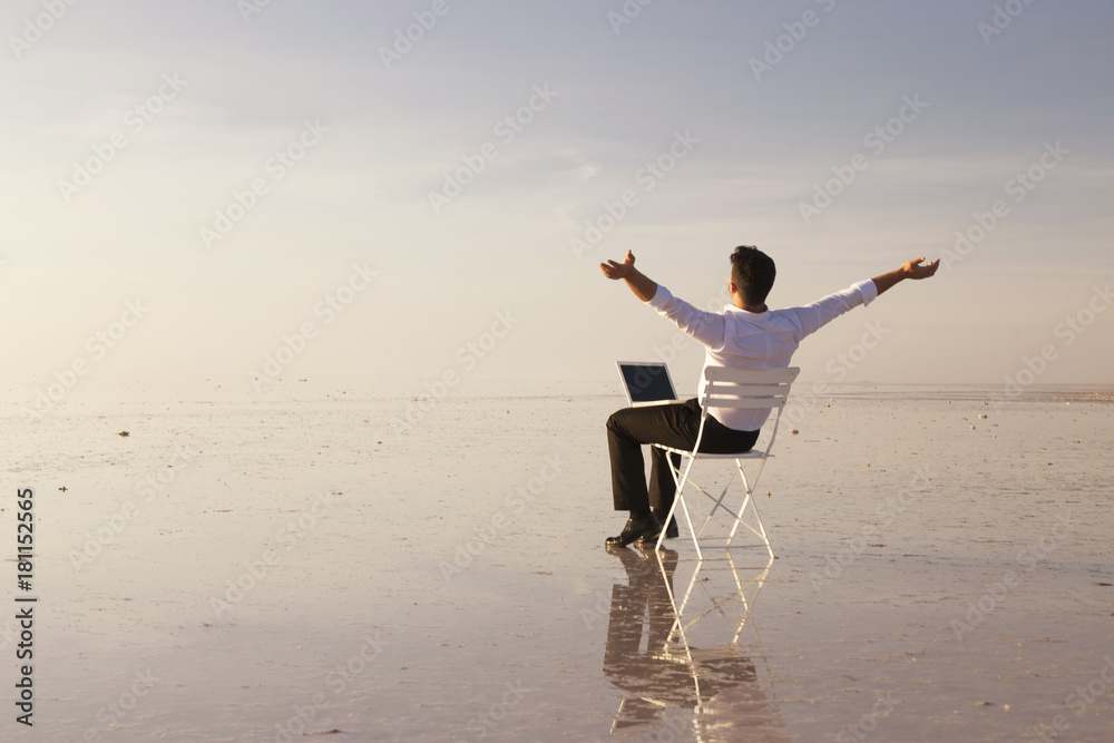 custom made wallpaper toronto digitalBusiness man with laptop working on the beach