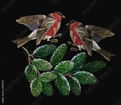 Embroidery two red bullfinches and fir-tree branches. Merry Christmas classical embroidery snow-covered branch of a fir-tree. Christmas fashion t-shirt art