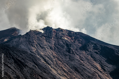 Close up of summit crater of the active volcano Stromboli with Sciara del Fuoco, photographed from a boat.