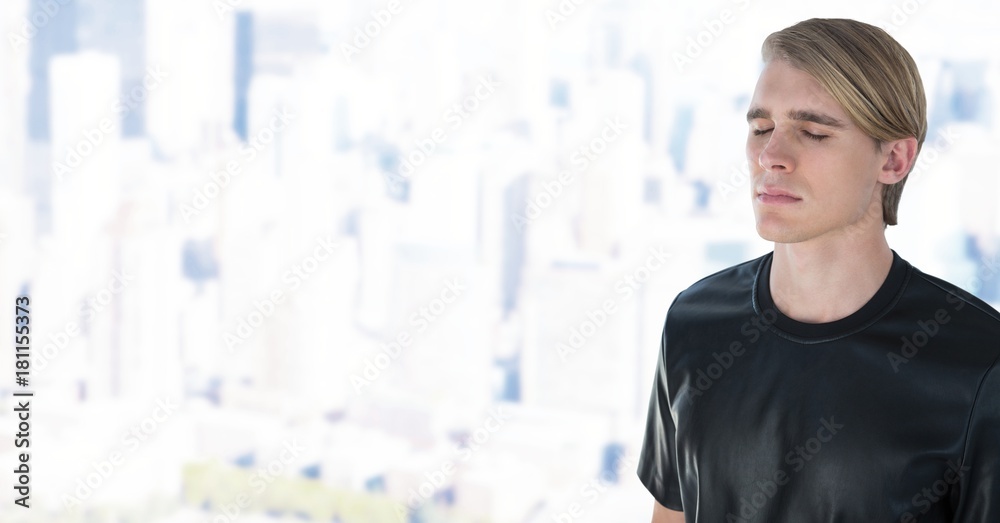 Businessman with eyes closed in city