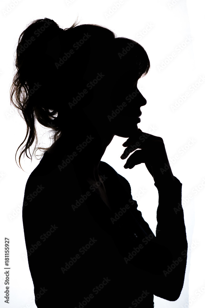 silhouette of a thoughtful woman with hand near her chin thinking about solving a problem on white isolated background