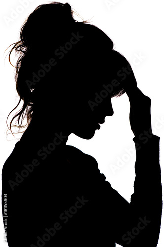 silhouette of a thoughtful sad woman with hand near her forehead on white isolated background, the concept life problems and depression
