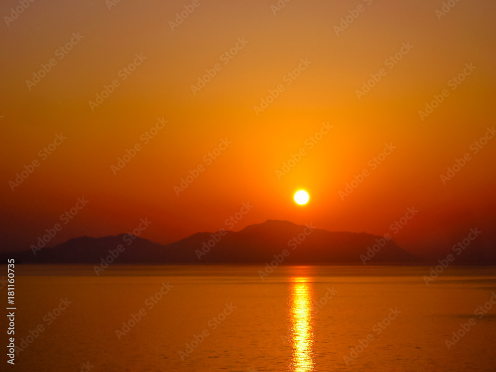 Sunset light on the Red Sea, at Sharm el Sheikh. Sinai Peninsula, Egypt. Copy space and orange color. Sunset background.