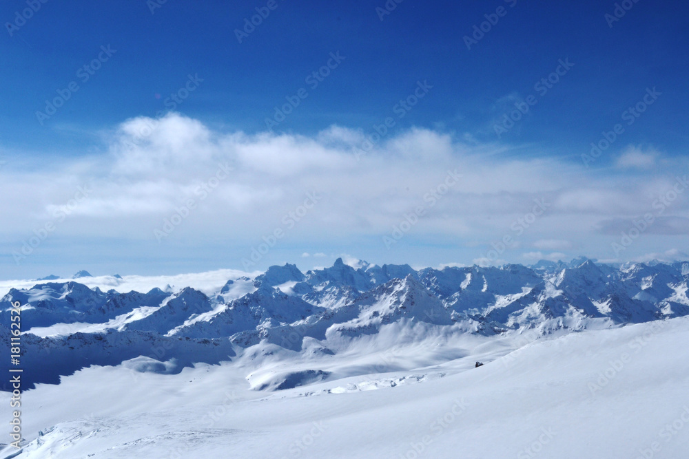 beautiful winter mountains with blue sky, snowy peaks. amazing scenic nature landscape. beautiful winter mountains with blue sky, snowy peaks. amazing scenic nature landscape.