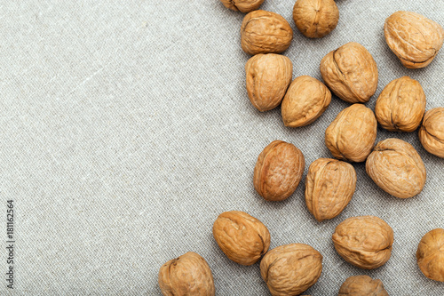 Food background with nuts on cloth and copy space.