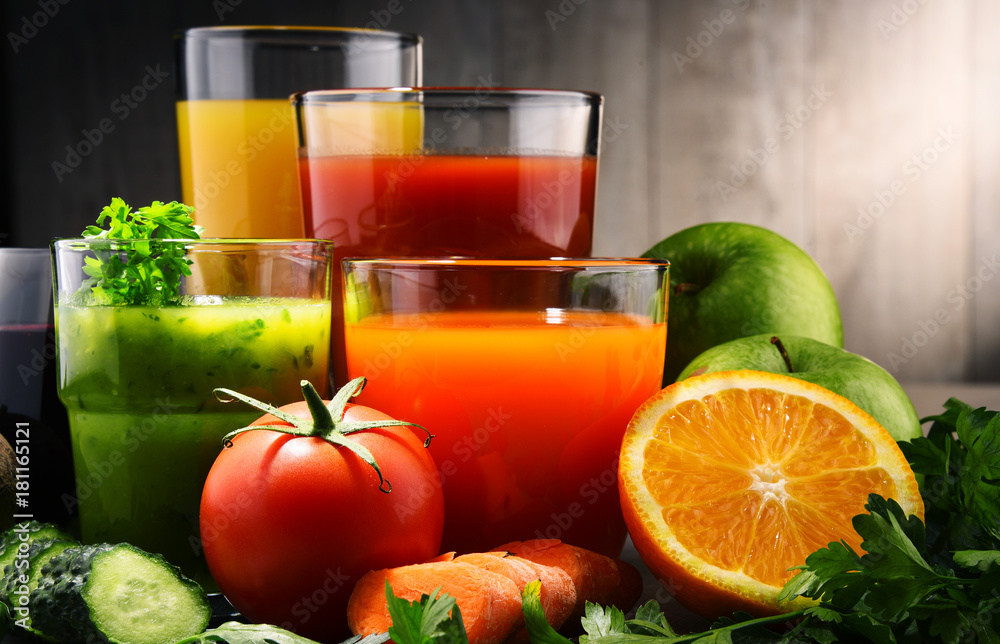 Glasses with fresh organic vegetable and fruit juices Glasses with fresh organic vegetable and fruit juices