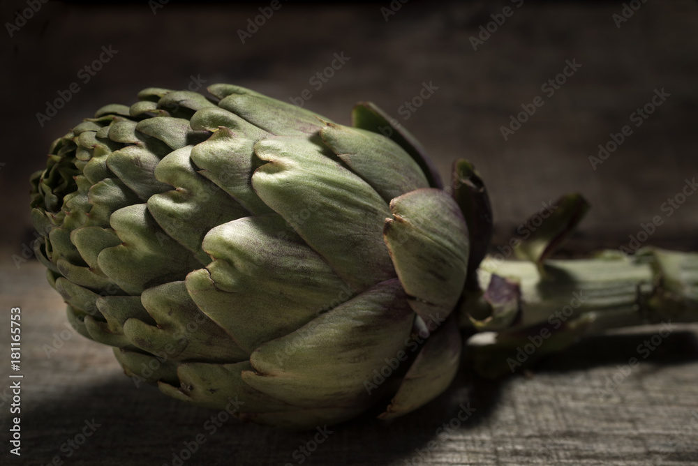 Fototapeta premium artichoke on wood