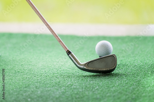 Golf ball on a green background at Golf clubs