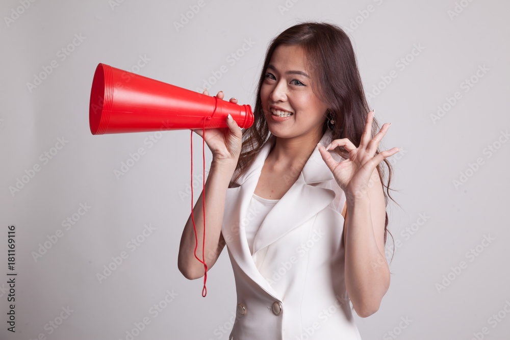 Beautiful young Asian woman show OK announce with megaphone. Beautiful young Asian woman show OK announce with megaphone.