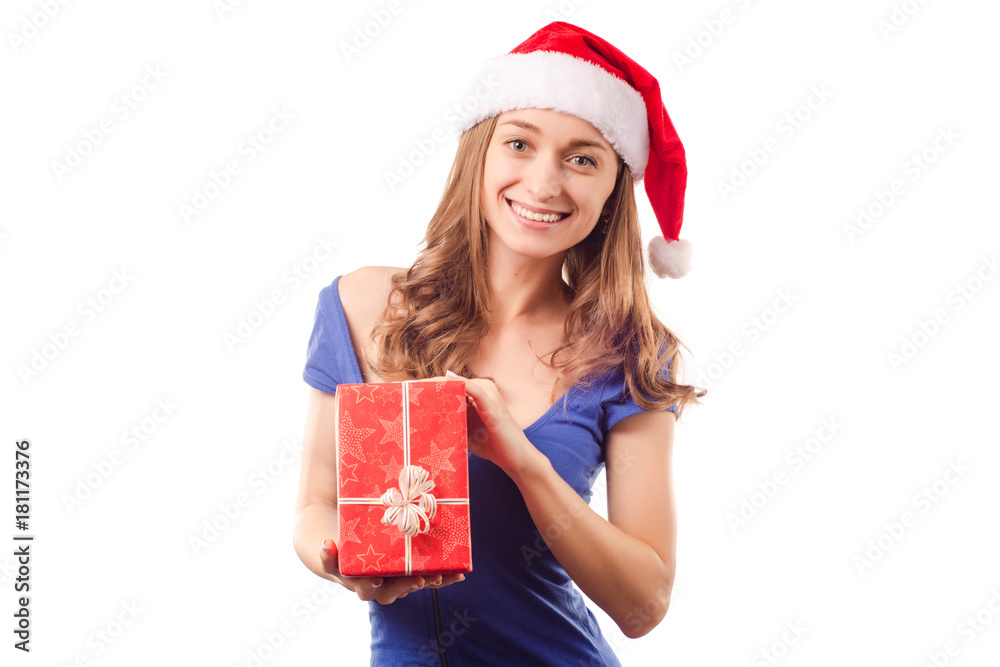 Young beautiful woman in hands holding a new year christmas holiday gift Young beautiful woman in hands holding a new year christmas holiday gift