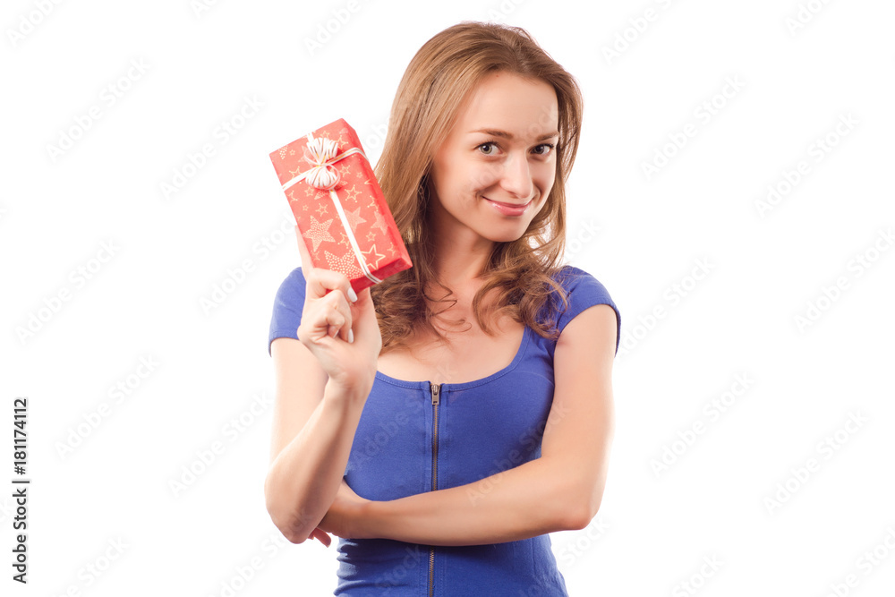 Young beautiful woman in hands holding a holiday gift Young beautiful woman in hands holding a holiday gift