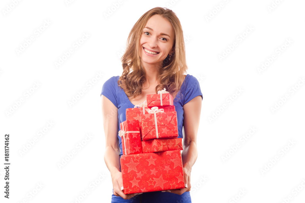 Young beautiful woman in hands holding a holiday gift Young beautiful woman in hands holding a holiday gift