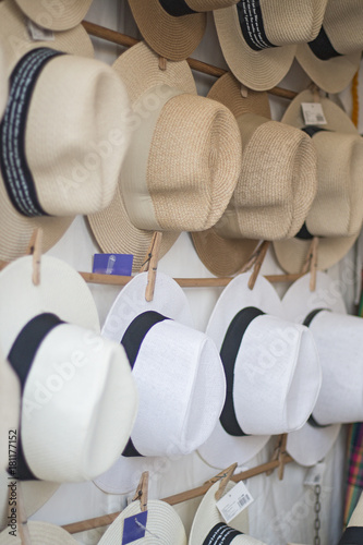 Many summery man's hats.