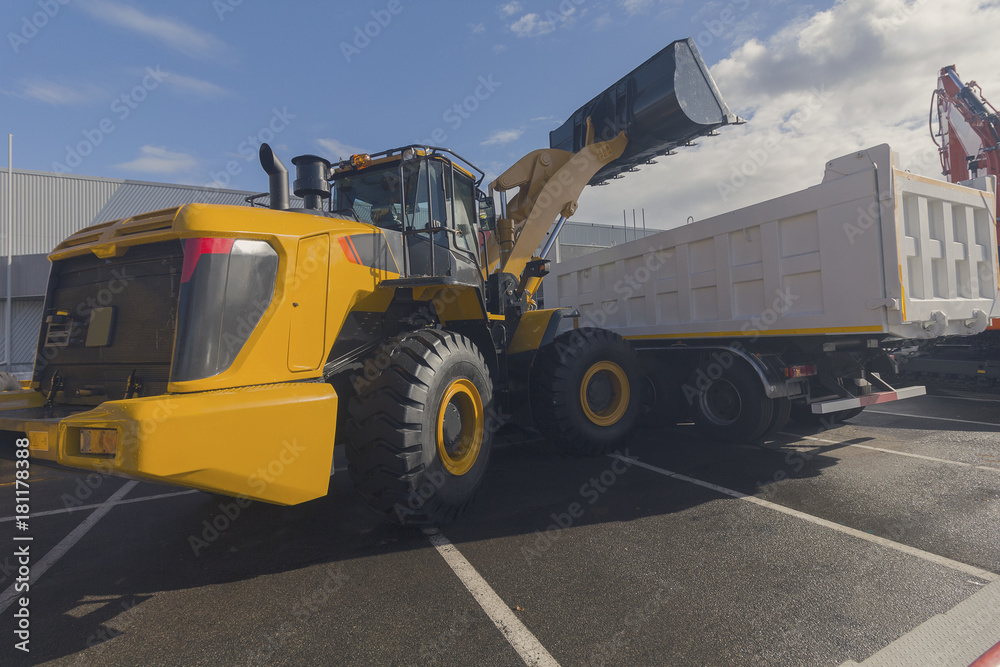 Loader and dumper on the exhibition site. Industry Loader and dumper on the exhibition site. Industry