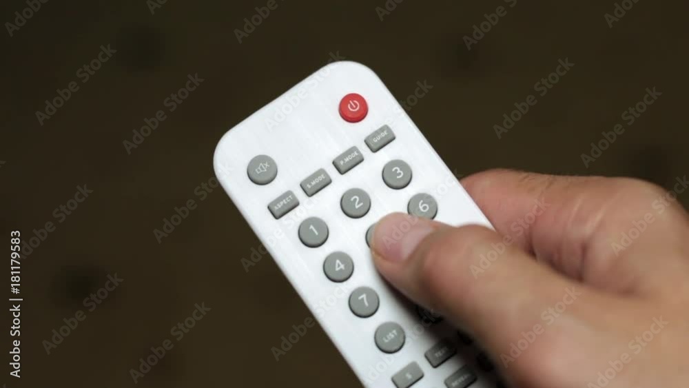 person switches the TV remote control person switches the TV remote control