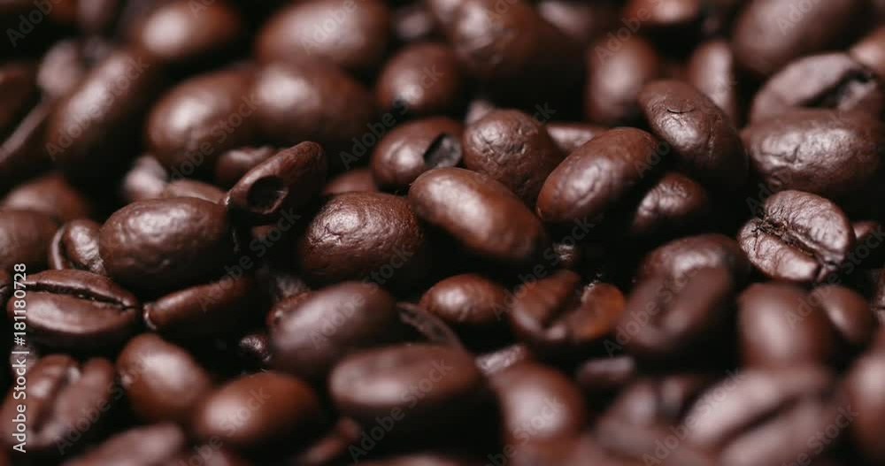 Roasted coffee bean in rotation Roasted coffee bean in rotation