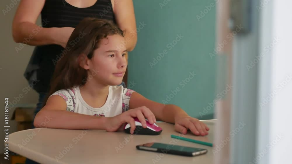 mom woman doing indoor daughter her hairstyle to her little girl teenager mom woman doing indoor daughter her hairstyle to her little girl teenager