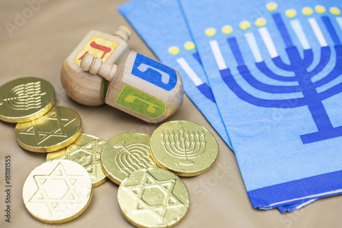 фотографія Traditional Hanukkah Dreidels, Napkins and Chocolate Gelt Coins
