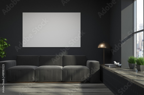 Black loft living room, gray sofa, poster