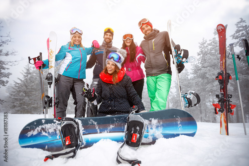 Group of friends on winter holidays - Skiers having fun on the snow