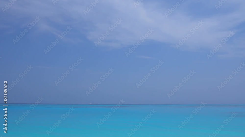 Tropical sandy coastline with calm waves. Maldivian destination with nobody Tropical sandy coastline with calm waves. Maldivian destination with nobody