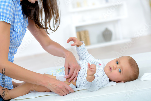 changing the baby's nappy