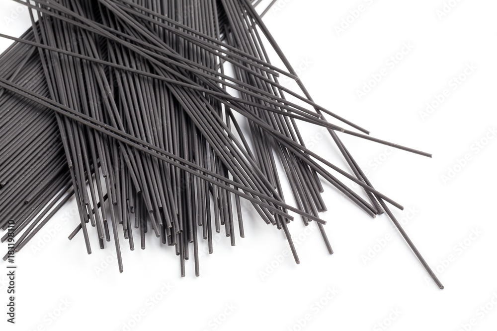 Bunch of spaghetti on white background, top view Bunch of spaghetti on white background, top view