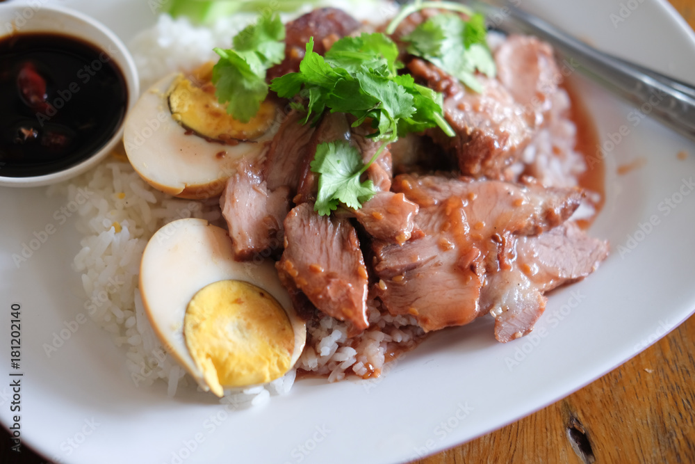Barbecued red pork in sauce with rice Barbecued red pork in sauce with rice