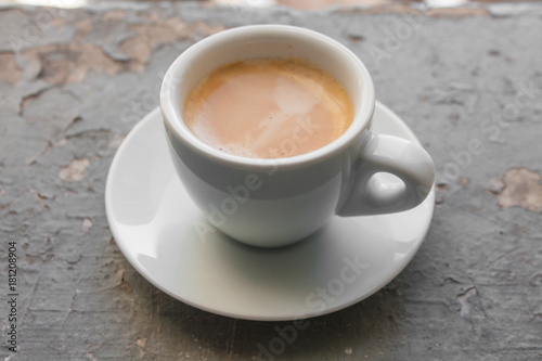 Cup of coffee espresso  top view on grey grunge background