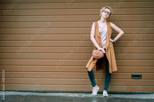 woman on a brown wall background