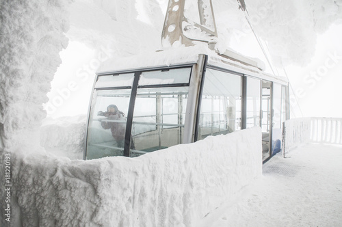 Snow covered Ropeway Gondola lift at Mt. Hakkoda, Aomori, Japan photo