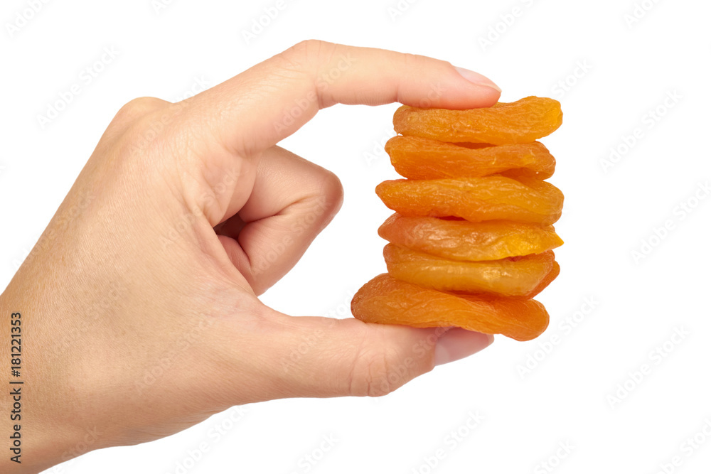 delicious and healthy dried apricots in hand isolated on white background, healthy sweet snack delicious and healthy dried apricots in hand isolated on white background, healthy sweet snack