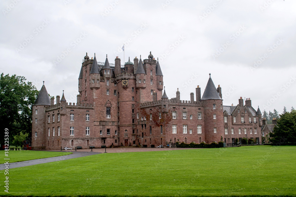 A really large Glamis castle with a garden located in central Scotland