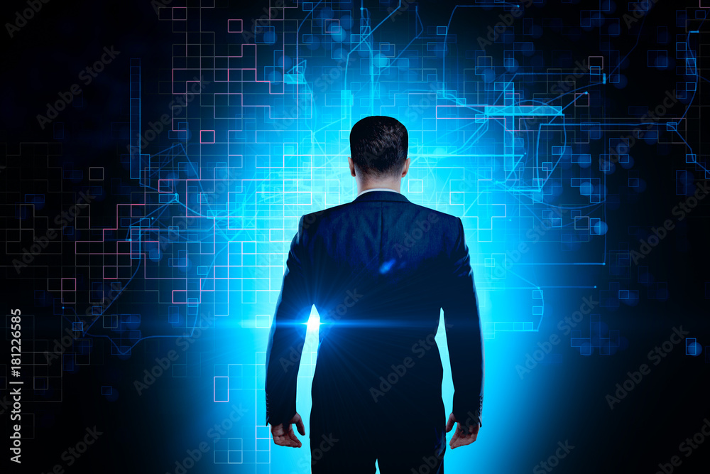 Businessman on abstract tech background Businessman on abstract tech background