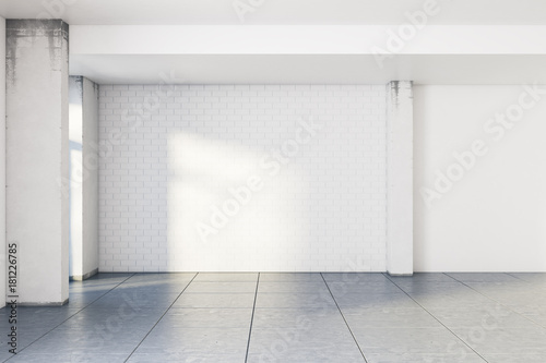 Modern white brick interior with empty wall