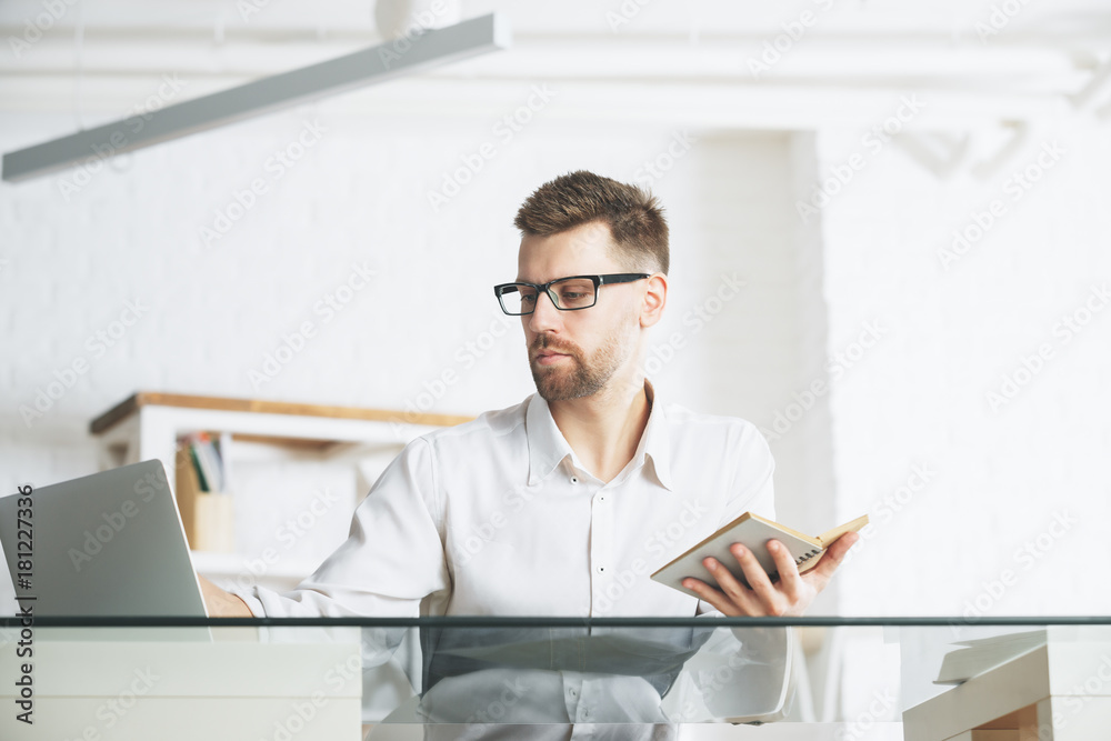 Caucasian man working on project Caucasian man working on project