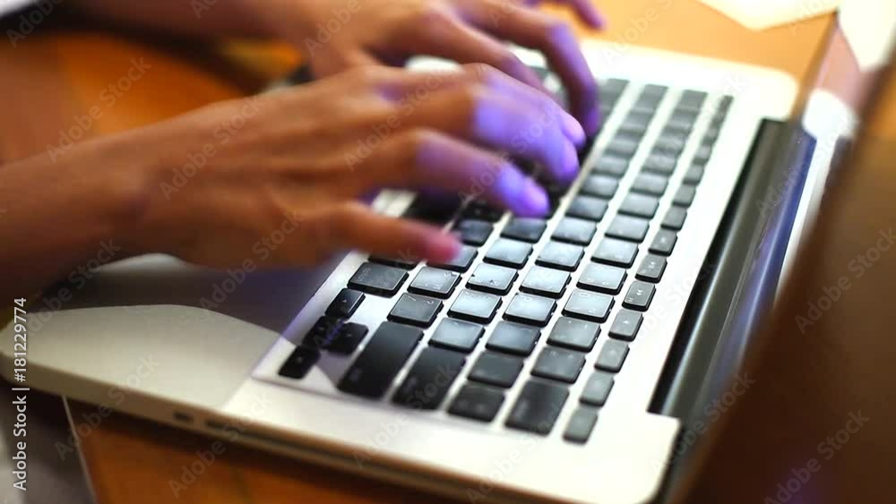 Women's hands typing working on computer keyboard Women's hands typing working on computer keyboard