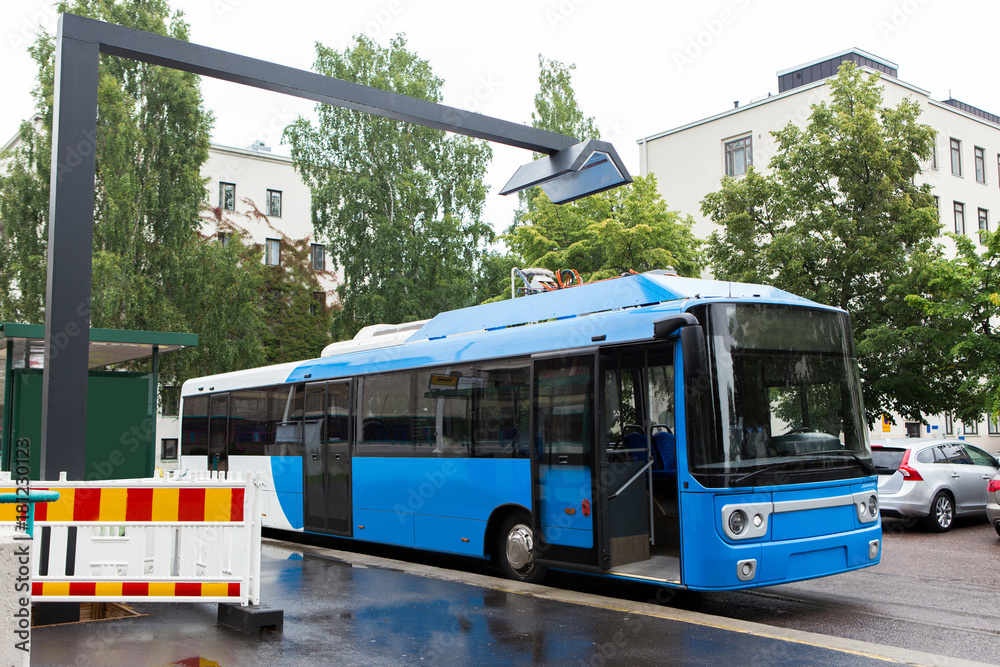 Electric bus is charged by wireless induction charging