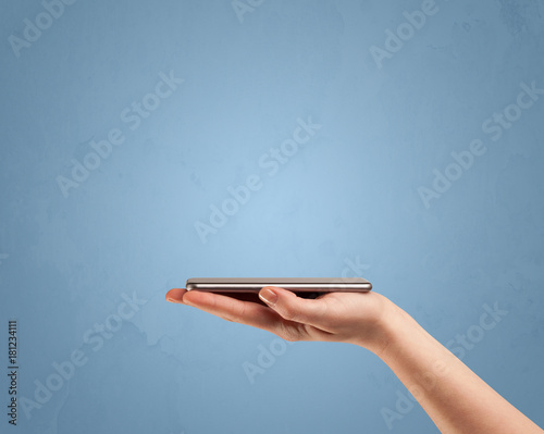 Holding telephone device from profile