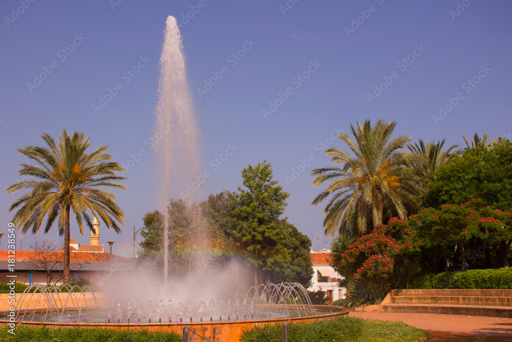 Park. Beautiful fountain and rainbow. Costa del Sol, Andalusia, Spain.