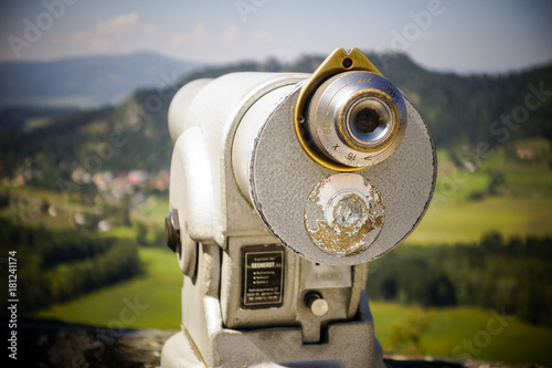 Close-up of stationary telescope for inspecting landscape