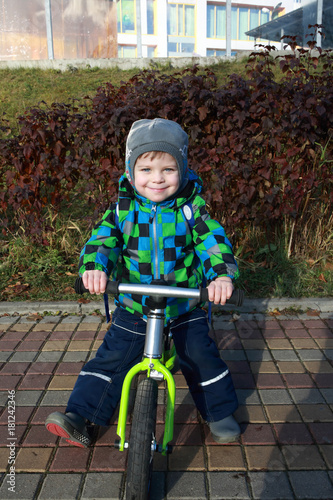 Kid using balance bike