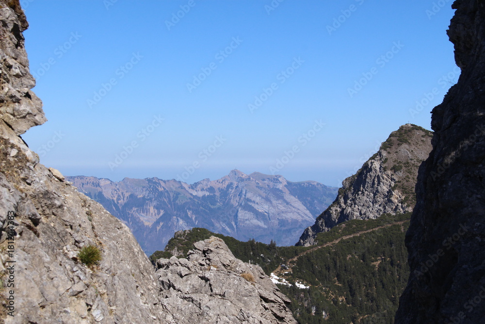 Landscape of snowy Alp mountains with forests, taken from Alpspitz peak in Gaflei village in the municipality of Triesenberg in Principality of Liechtenstein. Landscape of snowy Alp mountains with forests, taken from Alpspitz peak in Gaflei village in the municipality of Triesenberg in Principality of Liechtenstein.