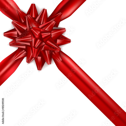 Red bow with ribbons on white gift isolated.